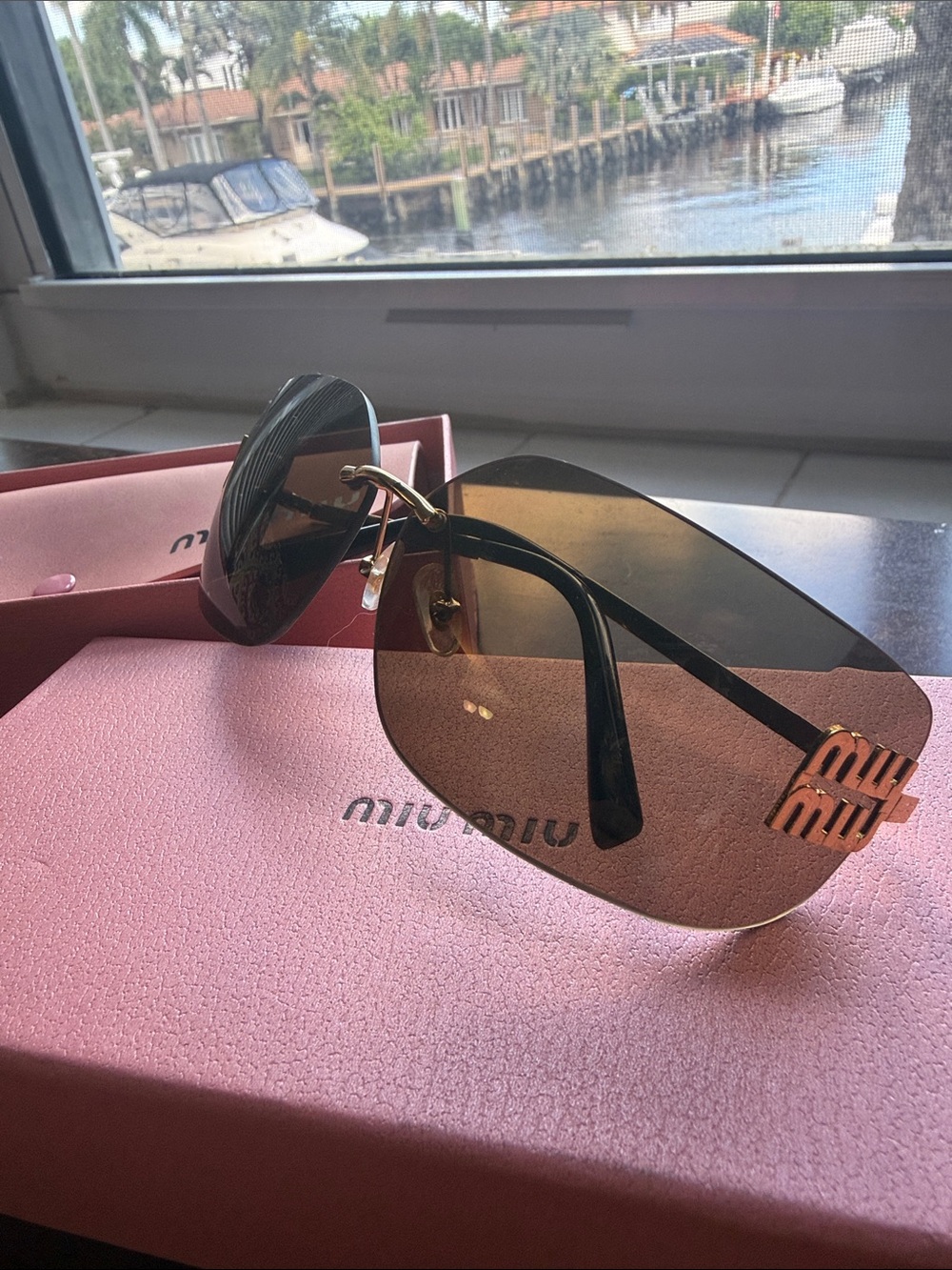 Miu Miu Rimless Sunglasses with Brown Gradient Lenses and Gold Accents